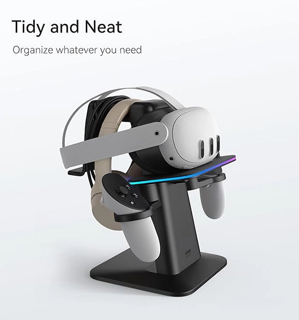 Virtual reality headset and controllers neatly organized on a black stand, shown under text that reads "Tidy and Neat. Organize whatever VR accessories you need.