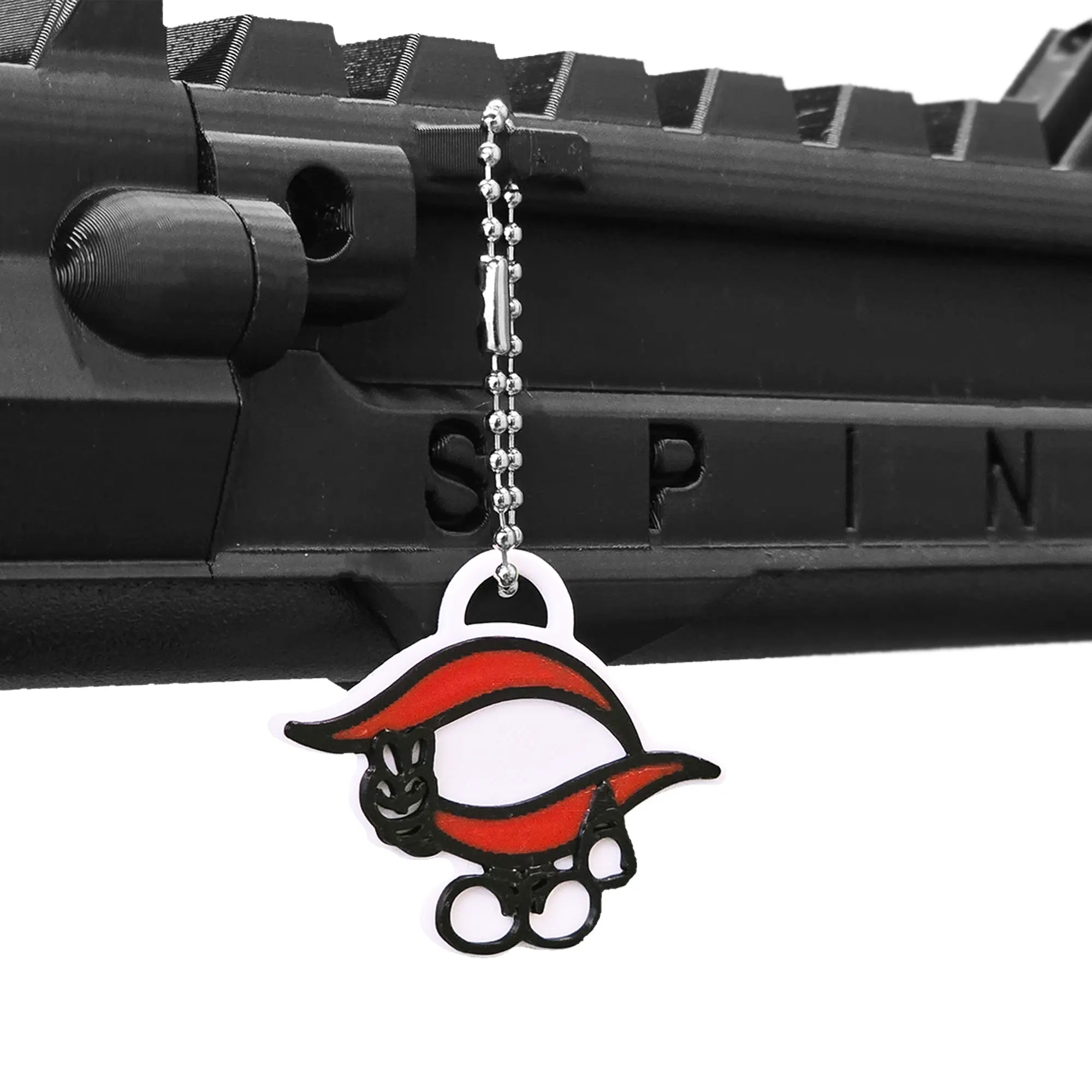Olen VR Peace logo keychain hanging from a SPINE VR Gun Stock using a ball chain